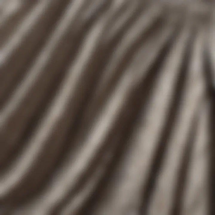 Close-up of fabric texture of a patterned pleated skirt