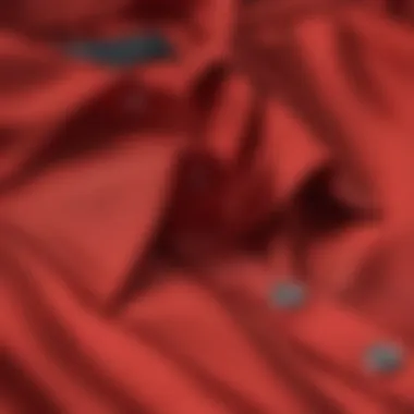 A close-up of luxurious fabric used in a red shirt