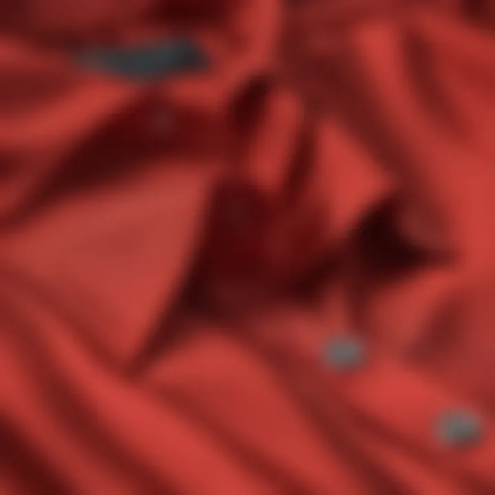 A close-up of luxurious fabric used in a red shirt