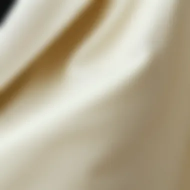 Close-up of fabric texture of a cream suit