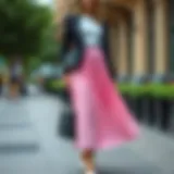 A stylish pink pleated skirt showcased in a chic urban setting