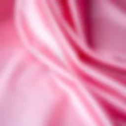 Elegant pink satin fabric draping gracefully